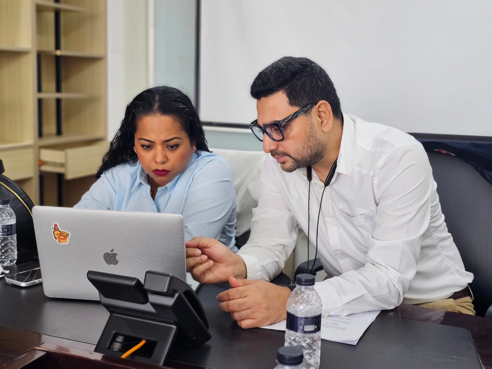 Syed Wasi mentoring a CILL student at the centre